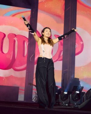 Claudia Tan Instagram - Starting 2024 on the highest note ✨

Still can’t get over our NYE performance at @theexchangetrx . Best crowd ever ❤️

Band: @irwinandfire @euwynilose @soloman__d 

📷: @ravinsawesomepictures 
Outfit: @redbeancloset (pants) @anne.lmm (gloves)