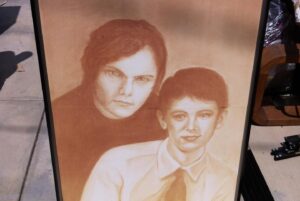 Colin Hanks Instagram - Yesterday was the 19th anniversary of the theatrical release of Orange County. Quite frankly, that is insane. Can't remember if I've told this story or not but I used to have this bit of memorabilia that some might recognize from the movie. The plan was to hold onto it for a stupid amount of time and then give it to @jackblack as a gift at some point. Sadly, it got warped in storage a few years ago and couldn't be saved. The painting is literally based on my senior year photo and one of Jack's early headshots. I was told by @spellnospell, our production designer, that he had found a portrait artist that makes everyone look slightly alien and thought it would be funny if it was part featured prominently in the Brumder home. Nailed it.