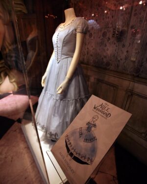 Colleen Atwood Instagram - Costume display featuring Alice’s signature dress from the 2010 film