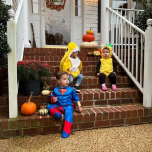 Collette Wolfe Instagram - A grumpy Superman and his parents #halloween2022