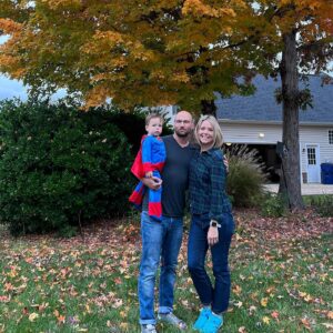 Collette Wolfe Instagram - A grumpy Superman and his parents #halloween2022