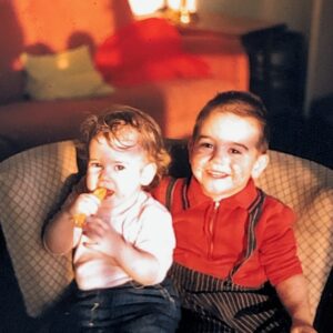 Corrine Koslo Instagram - Looking through old negatives.
Could be here for a long time.
My Father loved taking  photographs and I inherited that love.
My brother Tim and I in France.
I remember that chair!
#memoriesfromlongago#brothersandsisters