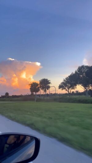 Cortney Palm Instagram - Do you see a shape in the clouds? - Driving to Miami - September Sky