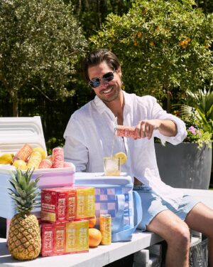 Craig Conover Instagram - I’m so excited to announce that I am now an investor in @spritz! I first found out about Spritz last summer when me and Paige were on our way to @taylorswift at Metlife and the party bus was stocked with these delicious wine spritzers. One sip was all it took for me to realize they were onto something and I needed to learn more about the brand – I loved the concept of a refreshing wine based drink & how they brought everyone together. 

Once I found out @boywithnojob & @girlwithnojob owned the brand, I knew I had to get involved somehow. I’m so excited to be in the Spritz Society family and for y’all to see the amazing projects we’ve got in the works. In the meantime, my code CRAIG20 is live now at spritzsociety.com!