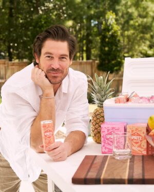 Craig Conover Instagram - I’m so excited to announce that I am now an investor in @spritz! I first found out about Spritz last summer when me and Paige were on our way to @taylorswift at Metlife and the party bus was stocked with these delicious wine spritzers. One sip was all it took for me to realize they were onto something and I needed to learn more about the brand – I loved the concept of a refreshing wine based drink & how they brought everyone together. 

Once I found out @boywithnojob & @girlwithnojob owned the brand, I knew I had to get involved somehow. I’m so excited to be in the Spritz Society family and for y’all to see the amazing projects we’ve got in the works. In the meantime, my code CRAIG20 is live now at spritzsociety.com!