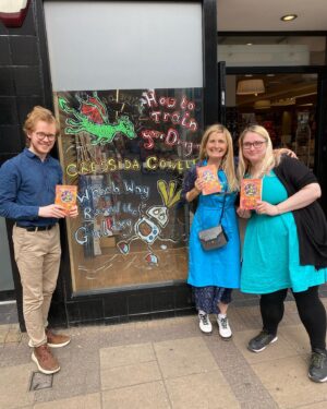 Cressida Cowell Instagram - Here with lovely booksellers at the windows I painted for the Which Way Round the Galaxy book tour …in @Waterstones High Street Ken, Wimbledon, and Clapham. I signed loads of copies of the Which Way books but also Dragons and Wizards books if you live in any of those areas and like a signed book for yourself or as a present…

We ran out of time for me to paint the window of Waterstones Kingston, which was such a shame, because it’s such a beautiful store! (Note to self, four windows in one day a little tricky!) BUT here with wonderful booksellers in that store, and we signed loads of copies so if you live nearby…

@waterstoneskingston 
#❤️📚
#readingismagic
#Waterstonesminitour