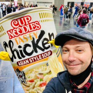 DJ Qualls Instagram - How did this happen? How did I wind up so unpopular? I strolled into @germancomiccon like a 
G; getting all the love. Lotta people showed up just for me! So nice. I saw some great cosplay, did some action shots with fans, went to my first German Christmas market, reconnected with old friends (they are mostly famous people…just saying) and made some amazing friends (😘😘😘). But mostly, I laughed my ass off and had a great time…but then something changed. Around photo 7. If only I could put my finger on it. Anyway, @chelseyreist showed up at the airport. She’s on my flight to London and we will share our layover. Score! I was stoked but then I had a really hard time getting my bag checked. Like really hard. Then a security guy at Düsseldorf airport yelled at us and a sample sized contact solution nearly caused an international incident. Ok, a bit of bad luck, who cares? “Hey Chelsea, let’s hit the bar!” It was so fun. We had the best cheese pretzel we’d ever had (and the booze wasn’t bad, either). But the mood went south again. I’m getting some hard looks. Now we get to the last photo. How did I wind up the 12th most despised man in Europe on Dec 6th? Are their clues in photos 7, 8 and 9? Hmmm, If only I could put my finger on it. 

Anyway, thank you Germany and @germancomiccon! We had a blast with you. I’m laying here right now warm in my bed and looking at all the memories. Until we meet again…

PS photo 6 is a lifetime favorite. @rickywhittle I love laughing with you. As for the rest of you 4 tagged here, you know how I feel about you. You are missed already.