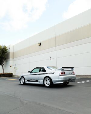 Daijiro Yoshihara Instagram - The DAI33 is officially up for sale and listed on our website! This car was built in partnership with Turn14 and GReddy to be the ultimate R33 GTR street car for racing driver Dai Yoshihara!

Dai was 2011 Formula Drift Series Champion and has more than 10 yeas of experience with championships in Drifting and Road Racing, time attack, hill climb and instructing with multiple championships and records.

His driving skills and vehicle knowledge also expand into non-competition driving that includes stunt driving, tire/suspension testing and vehicle evaluation. His knowledge across all disciples and vehicles is reflected throughout this build making it truly one of a kind!

The car was built at GReddy in Irvine with the build managed by GReddy President Kenji Sumino himself. 

SPECS

Engine 
RB26
GREDDY 2.8L STROKER
CNC PORTED CYLINDER HEAD
SUPERTECH VALVETRAIN

Turbocharger 
GReddy GP64R
64MM BILLET COMPRESSOR WHEEL
66MM INCONEL TURBINE WHEEL

Drivetrain
DRIVESHAFT SHOP Axles 
DRIVESHAFT SHOP carbon driveshaft 
OS GIKEN F/R LIMITED. SLIP DIFFERENTIAL

Exterior 
CARBON SIGNAL DRY CARBON HOOD 
EVASIVE CARBON GT LM MIRRORS

Gearbox
OS GIKEN 0S88 SEQUENTIAL
OS GIKEN CLUTCH

Engine Mangement 
HALTECH RS
HALTECH WIRING HARNESS

Suspension 
OHLINS ROAD & TRACK COILOVERS
SPL SUSPENSION ARMS
SPL SPHERICAL BUSHINGS
SPL SWAY BARS

Wheels 
TITAN7 T-07S3 F/R I8XI0.5  18 OFFSET

Tires 
YOKOHAMA ADVAN NEOVA ADO9 F/R 265/35/18

Brakes 
STOPTECH BIG BRAKE KIT 
STOPTECH BRAKE LINES

Interior 
HALTECH IC-7 DASH
GREDDY HARNESS BAR
RECARO SPEED V SEATS
GREDDY STEERING WHEEL
PIONEER AUDIO COMPONENTS

Fuel System 
RADIUM ENGINEERING COMPONENTS
DYME PLUMBING

#gtr #r #rb #skyline #r33gtr #nissan #jdm #nismo #r33