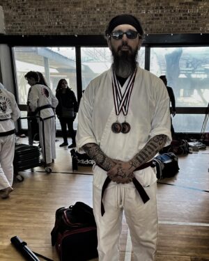 Damien Echols Instagram - A few shots from yesterday’s tournament in Texas. I snagged a couple of new medals to add to my collection - one for staff and me for sparring. Thank you to @austinkarateacademy for hosting an amazing event, and to all the other schools for competing and making it an overall great day. 
Now it’s back home to start practicing for the next one.
One of the things I love about martial arts is how it emphasizes that everything is training - just like in zen. That it’s not something we do just on the mat or in the ring - it’s all of life. Training to reach greater states of mental, emotional, and spiritual maturity, as well as physical fitness. It trains you to look at every activity - as well as every difficulty and hardship - as a way to continue refining and purifying ourselves in order to reach our full potential.