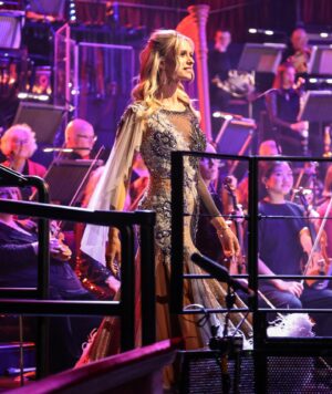 Dan Walker Instagram - An incredible night at @royalalberthall I got to dance for the first time in one of the most iconic venues in the world watched by my mum and my daughter.

@mrdanwalker and I got to dance at Prom Praise in front of thousands of people to the most beautiful piece of music, Chariots Of Fire from Vangelis, at a celebration of the life and legacy of Eric Liddell. It is hard to describe how it feels to be dancing on stage surrounded by a full orchestra.  It is like floating on air. You can feel the music underneath your feet.

We were so well looked after by the Prom Praise production and I wanted to thank all the volunteers who made it so special and the whole team behind it.

It was such an inspiring night and I will hold those memories forever.

Thank you to @brett_d_cove for capturing some of the magic both on and off the stage.

P.S. We might come back next year with our lobster outfits