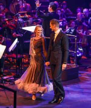 Dan Walker Instagram - An incredible night at @royalalberthall I got to dance for the first time in one of the most iconic venues in the world watched by my mum and my daughter.

@mrdanwalker and I got to dance at Prom Praise in front of thousands of people to the most beautiful piece of music, Chariots Of Fire from Vangelis, at a celebration of the life and legacy of Eric Liddell. It is hard to describe how it feels to be dancing on stage surrounded by a full orchestra.  It is like floating on air. You can feel the music underneath your feet.

We were so well looked after by the Prom Praise production and I wanted to thank all the volunteers who made it so special and the whole team behind it.

It was such an inspiring night and I will hold those memories forever.

Thank you to @brett_d_cove for capturing some of the magic both on and off the stage.

P.S. We might come back next year with our lobster outfits