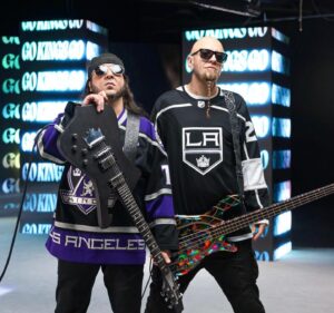 Daron Malakian Instagram - Had a great time with my brother @ShavoOdadjian at the @LAKings promo photo shoot!!!!! The jersey I’m wearing is the same one I wore in the #Toxicity video 20 yrs ago!!!! First time I’ve put it on since then. The Iceman guitar is also from the same time period, with the LA Kings style crown bridge.

Photos by @armenkeleshian and @masismananian 

#GoKingsGo #LAKings #NHL #IcemanGuitars #Ibanez #DaronMalakian #ScarsOnBroadway #DMSOB #SystemOfADown #SOAD