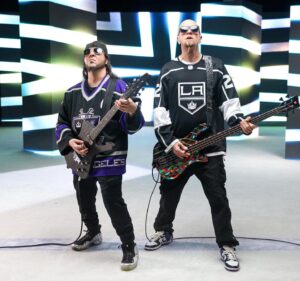Daron Malakian Instagram - Had a great time with my brother @ShavoOdadjian at the @LAKings promo photo shoot!!!!! The jersey I’m wearing is the same one I wore in the #Toxicity video 20 yrs ago!!!! First time I’ve put it on since then. The Iceman guitar is also from the same time period, with the LA Kings style crown bridge.

Photos by @armenkeleshian and @masismananian 

#GoKingsGo #LAKings #NHL #IcemanGuitars #Ibanez #DaronMalakian #ScarsOnBroadway #DMSOB #SystemOfADown #SOAD