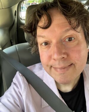 Dave Hill Instagram - Snapped this photo of my identical cousin Peg today as she was pulling up to Bennigan’s. People say we look alike but I don’t see it. She’s in from Sarasota and predictably drunk already. I will pay as usual.
