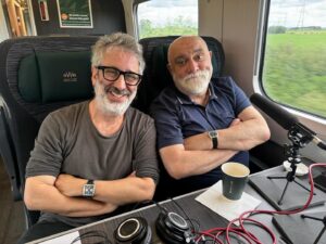 David Baddiel Instagram - Bumped into old friend and Godfather of modern stand up Alexei Sayle on the train to Hay Festival - so ended up having a joyous chat for his fab Strangers On A Train Radio 4 show.