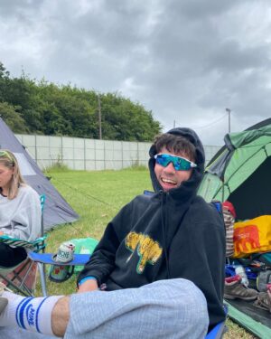 Declan McKenna Instagram - Some Glastonbury bts for yas, another year roaming the magic farm. What a smash it was.
Cheers to everyone who came to my gig, what an absolute vibe and a dream to play to a yuge crowd down the woodsies.

My highlights for those interested:

Friday
Running up to the park after my gig to catch the second half of @edgar_the_breathtaker unreal set featuring cutest moment of the whole thing followed by @fontainesband transitional   epic headline show.

Saturday
@maryinthejunkyrd virtuosic gig getting a melting midday crowd chanting for more on bbc introducing
@mikeskinnerltd   co filling the other stage with both an impending sense of dread and bursting love,
@coldplay bar about 20 minutes of pure waffling was a smash - waffling still somewhat entertaining.
As always if @flamingodsmusic are playing a post headliners set at the hms sweet charity - don’t you dare miss it, shit hot band, absolutely pumping.

Sunday 
@mdou_moctar infecting the sore legs of sunday mid afternoon with the groove   probably the most rippin guitar playing of the whole thing. Out-Rageous.
@mountkimbie also on unreal form at the park   king krules return.
And for me the best of all was a completely exhillerating final 1 2 punch of @etjusticepourtous hypnotic and hard hitting masterclass in electronic music, sound and visuals in a league that belongs only to them over on the west holts followed right after by a raucous crowd at the wild and sometimes absolutely fucking metal perfomance from @thescratchmusic in shangri la.

Always too much to see, always too good to miss! Love ya @glastofest