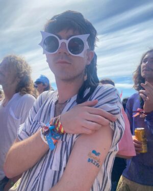 Declan McKenna Instagram - Some Glastonbury bts for yas, another year roaming the magic farm. What a smash it was.
Cheers to everyone who came to my gig, what an absolute vibe and a dream to play to a yuge crowd down the woodsies.

My highlights for those interested:

Friday
Running up to the park after my gig to catch the second half of @edgar_the_breathtaker unreal set featuring cutest moment of the whole thing followed by @fontainesband transitional   epic headline show.

Saturday
@maryinthejunkyrd virtuosic gig getting a melting midday crowd chanting for more on bbc introducing
@mikeskinnerltd   co filling the other stage with both an impending sense of dread and bursting love,
@coldplay bar about 20 minutes of pure waffling was a smash - waffling still somewhat entertaining.
As always if @flamingodsmusic are playing a post headliners set at the hms sweet charity - don’t you dare miss it, shit hot band, absolutely pumping.

Sunday 
@mdou_moctar infecting the sore legs of sunday mid afternoon with the groove   probably the most rippin guitar playing of the whole thing. Out-Rageous.
@mountkimbie also on unreal form at the park   king krules return.
And for me the best of all was a completely exhillerating final 1 2 punch of @etjusticepourtous hypnotic and hard hitting masterclass in electronic music, sound and visuals in a league that belongs only to them over on the west holts followed right after by a raucous crowd at the wild and sometimes absolutely fucking metal perfomance from @thescratchmusic in shangri la.

Always too much to see, always too good to miss! Love ya @glastofest