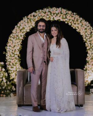 Deepak Parambol Instagram - Underneath the golden hues of the setting sun, we danced into forever, surrounded by love’s gentle embrace on the sands of our beginning.

Bride makeup - @ashif_marakkar 

Costume- @aheli_clothing 

Groom makeup- @groommakeup_bloomsmakeover 

Styled by : @soorajskofficial 

Outfits : @bespokedbysk 

#deepakaparnawedding #wedding #weddingreception #beautifulmoments