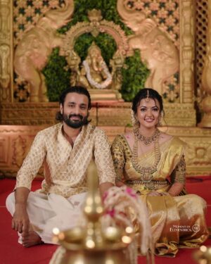 Deepak Parambol Instagram - Entwined in the eternal dance of love, our hearts beat as one beneath the canvas forever.

Captured By : @momentssbyelemntricx

Bridal makeup - @ashif_marakkar 

Brides Outfits - @kanchivaram.in 

Blouse- @gala_galore_ 

Saree draping- @draping_damini 

Groom outfit - @masharhamsa @gospelofdesign 

Groom makeup - @groommakeup_bloomsmakeover 

#aparnadeepakwedding #traditionalwedding #aparnadaswedding #deepakparambol #preciousmoments