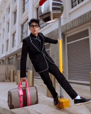 Desmond Tan Instagram - Swinging through life, one spin at a time! Ready to take flight? 🛫 

#GucciValigeria @gucci
