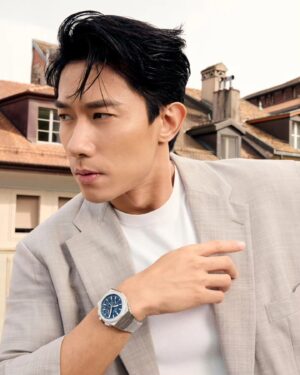 Desmond Tan Instagram - I'm already longing for Geneva! 🇨🇭 

If I had to pinpoint my zenith moment, it would undoubtedly be my inaugural trip to Watches and Wonders with @zenithwatches! I immersed myself in Zenith's rich heritage and aspired to the stars of its vision. 

Sporting the latest DEFY Skyline Chronograph serves as a poignant reminder to cherish our past achievements while relentlessly pushing boundaries to create anew, much like an actor perfecting their craft. 

The 42mm steel case represents a modern reinterpretation of the original DEFY's octagonal design, complete with a multi-sided bezel. The revolutionary 1/10th of a second #ElPrimero 3600 automatic movement breathes new life into the timepiece! 

This isn't just a watch; it's a symbol of defying conventions as I pursue my aspirations. 

#Zenith #ZenithWatches #DefySkylineChronograph
#Chronograph #ElPrimero #TimeToReachYourStar #WatchesandWonders