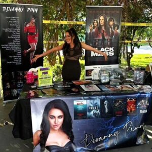 Devanny Pinn Instagram - So happy i was invited to be a horror guest at  @maagmarketplace to benefit @heritagemusoc today!

My booth was next to several lovely genre staples,  including new spooky friend Brett Wagner ( aka Leatherface from Texas Chainsaw Massacre 3D ) who had awesome goodies for sale so seek him out- and was so awesome helping me promote the release of my film #TheBlackMass (Feb 27th!)

Was such a fun event, great attendance of genre fans, a swarm of clowns and awesome staff. Ty to everyone who cane out to see me and purchased merch to support. And of course to @statik_talent_agency_llc for making it happen 
❤️ 👻 

#horrormovies #spooky #charity #Screamqueen #PINNing #horrorfanatic #orangecounty #Leatherface #arttheclown #foragoodcause