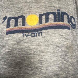 Dolly Wells Instagram - My dad went on this Sunday morning breakfast show to talk about the papers. One morning he put both hands on his head while talking and you could see a massive hole on each elbow. When he got to work the next Sunday he got given this. It’s shrunk a lot over the years. Miss you dearest dad. #johnwells ❤️❤️❤️