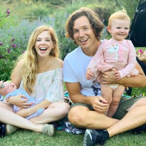 Dreama Walker Instagram - 8 days postpartum and we got to celebrate my birthday at the Arboretum yesterday with a socially distanced grass sitting. 
This is our first family picture with all 4 of us 💕 Photo cred to my @calibeets