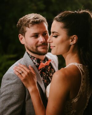 Drew Lynch Instagram - -PHOTO LOCOMOTIVE- 

Happy anniversary to my beautiful wife 🥹 Everyday I get to hang out with the person who makes me laugh the hardest. Thank you for saying yes. Thank you for our beautiful life. Please indulge a slideshow of our wedding day below, if you so choose… 

1) peep my bow tie upstaging her wedding ring 
2) I guess rain is good luck but also it’s annoying ? 
3) we cut the cake with an axe because Vermont is a savage land 
4) moments after someone caught the bouquet 
5) the bouquet (not joking) 
6) the local Vermont alcohol (maple syrup)