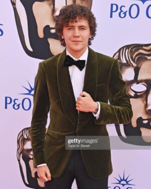 Dylan Llewellyn Instagram - Unbelievable night so proud of my Big boys and Derry girls families. Both up for best comedy @bafta . So chuffed to get the win. 
Thank you @styledbysrh for making me look fly
Shirt and suit, #kingsman  @mrporter
Watch, @hublot
Shoes, @grensonshoes

#crookedtie #bafta