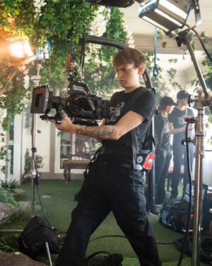 Dylan Riley Snyder Instagram - Behind the scenes photo by @bringoutthegold on the set of a new music video.