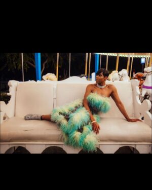 EJ Johnson Instagram - I personally curated both of my looks to fit the mystical and magical vibration of theme park. I brought high glamour and opulence to @sixflagsmagicmountain in this one of a kind @ysl gown and the @gucci and @versace look that gave a cotton candy fantasy 🍭 #ej30 #teamthis