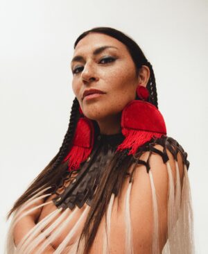 Élisapie Instagram - Derrière ces images pour « Inuktitut » de grands talents que je souhaite remercier chaleureusement. Artists, Designers, Photographer, Hair & Make-up artist, I’m so well surrounded, I’m lucky!

Nakurmiik, huge thanks to the wonderful photographer @leeorwild , the great @CarolyneDeBellefeuille for the art direction, Hair&Make Up & Magic! @juliecussonmakeupartist and the incredible @lathe for the styling!

and, here are the credits for each piece worn on the pictures:
1 Dress @camillie.david 
2 Dress @apierreolivier
3 Earrings: @anouapik Leather & Horse Hair Piece @morggan_jussaume 
4 Top: @antonioortegacouture
5 Dress @wiwa_blue
6 Jumpsuit @apierreolivier Heels @pleasershoes 💋•
•
•
•
#elisapie #inuktitut #inuk #inuit #albumcovershoot #indigenouswomen
