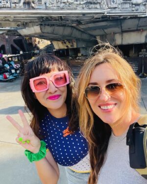 Elle Newlands Instagram - 7 miles of laughs at the happiest place on Earth yesterday with my fabby friend @weeclairehere (who hasn’t been to Disney since she was wee!). It was so lovely to see your face light up! (and introduce you to Dole Whip and Tajin) Such a fun day! Thank you to my lovely pal Josh for the surprise gift of tickets. Life is good 🤩 

And to the random lady photographer who somehow gave us both 11 foot long legs - what’s your secret??!??

#disneyland 
#disney 
#happiestplaceonearth