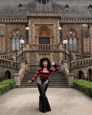 Ellie Diamond Instagram - ♥️🖤DENNIS FOREVER🖤❤️
-
Never in my 23 years would I have imagined that I’d be immortalised alongside Dundee history in my Dennis the menace look! It was an honour to reimagine this legendary Beano character as a 6”4 drag queen once again for the official opening. When creating the outfit for the show I wanted to keep all the traditional elements of Dennis but run the rest thru the Ellie diamond drag blender! I hope this piece being part of the gallery will show that Dundee has queer history and a powerful queer community that can make an impact outside of Dundee, no matter who you are! Achieving this really feels like my love letter to Dundee and all the challenges it threw at me. I may not have won a badge but this moment truly feels like a win, because who else has a wax figure of themselves? That’s history mawma! 💞