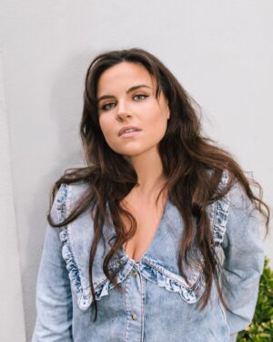 Emer Kenny Instagram - I’ve got some vicious covid and am wearing my worst pyjamas - but here I am without it, wearing @thevampireswife! Link in stories if you wanna read me talking about on-screen kissing, flunking auditions and how I want to go to Patagonia (region, not shop).

Photos by @ionawolffphoto
Makeup & hair by @hannahelizabethartistry 
Styling by @emmalanestylist
Shout out to @emhargreaves & @multitudemedia too!