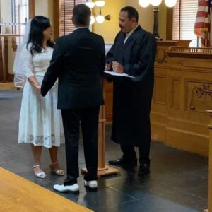 Emilio Rivera Instagram - It was a honor to be made Guest Officiant by Clerk Reporter of Orange County Hugh Nguyen. When ever given a chance a always like to give back to the community. Yesterday I was able to surprise 3 couples that I then married. Thank you to Mr. @hugh1967 and his team for being so professional of hospitable to me and my familia. To My Chula @yadi_rivera  and our Rock, thank you for all the love and always supporting me. Love you for all the time. #emiliorivera #elpadrino #familiafirst #forwardalways