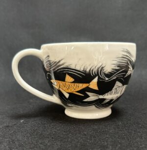 Emily Gravett Instagram - This is the second of my ‘matching’ cup and saucers. I showed you the other in yesterday’s post.
The cup on this one came out well, but I must’ve trimmed the saucer a bit thin and there’s a small crack by the foot. It’s a balancing act!! 
#potterylove #outofthekiln #porcelain #ceramicsart