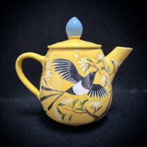 Emily Gravett Instagram - Do you remember my yellow magpie teapot? 
It was bought by a lovely lady in the US as a gift for a friend, but despite waiting for weeks it didn’t arrive. We tracked it to the US, and then rather strangely to Japan?! Then it disappeared. In the end the buyer bought her friend a different gift and I happily refunded her.
Then 2 days later what should appear in my postbox but the yellow teapot! It’s circumnavigated the world, and I’m delighted to see my packaging has stood up to the challenge. There’s not a scratch on it!
So- I will be putting it into my shop next week on Saturday 20th. There’ll be no sale on the 14th as I have a houseful of old friends coming to visit (hurrah!)
X #porcelain #potterylove #handmade
