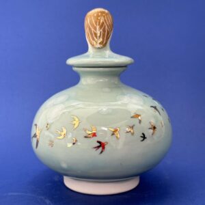 Emily Gravett Instagram - This is one of the more successful items out of my kiln this haul. 
I made three little moon jars and I think I like this one best. 
I’m still deciding whether or not to deglaze the other two as they didn’t come out as I’d expected.  #porcelain #owlsofinstagram #lustreware #nightowl #pottery #ceramics #handmade