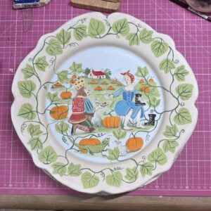 Emily Gravett Instagram - Here’s another fairytale plate destined for my wall. If you scroll right you can see the process it went through from start to end- although I am toying with the idea of adding a bit of gold lustre sometime in the future… #fairytaleonaplate #potterylove #pottery #ceramicsart #cinderella