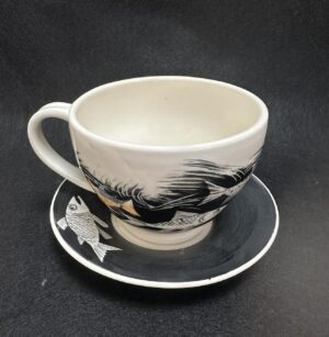 Emily Gravett Instagram - This is the second of my ‘matching’ cup and saucers. I showed you the other in yesterday’s post.
The cup on this one came out well, but I must’ve trimmed the saucer a bit thin and there’s a small crack by the foot. It’s a balancing act!! 
#potterylove #outofthekiln #porcelain #ceramicsart