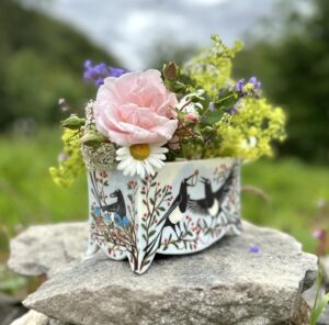 Emily Gravett Instagram - Happy Saturday!
I’ve not had much time for pottery (or social media) lately, and it’s taken me ages to finish a kiln load. Then it’s all been a bit disappointing. I had high hopes for this flower brick, but I can’t have wiped the feet properly after glazing because a couple of the feet chipped. Not drastically. It still stands fine and I ground it down, but it isn’t perfect. I have to decide whether to keep it or sell as a second.
Do excuse my flower arranging. It’s definitely NOT in my skill set unlike my good friend @laylarobinsondesign  who is a flower master. I’m more of a shove them in type!
More fails to follow, and a few I think I’ve saved with a touch of bling #handmade #magpiesofinstagram #handmade #ceramicsart #porcelain #flowerbrick #pottery #potterydisaster #magpie