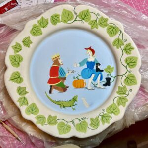 Emily Gravett Instagram - Here’s another fairytale plate destined for my wall. If you scroll right you can see the process it went through from start to end- although I am toying with the idea of adding a bit of gold lustre sometime in the future… #fairytaleonaplate #potterylove #pottery #ceramicsart #cinderella