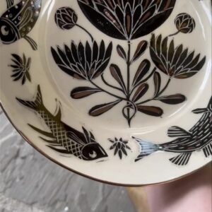 Emily Gravett Instagram - This is a little dish I made ages ago, but this week I did a lustre fire and thought I’d add a bit of bling. I think it’s really lifted it #pottery #ceramicsart #lustreware
