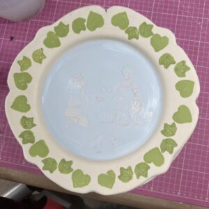 Emily Gravett Instagram - Here’s another fairytale plate destined for my wall. If you scroll right you can see the process it went through from start to end- although I am toying with the idea of adding a bit of gold lustre sometime in the future… #fairytaleonaplate #potterylove #pottery #ceramicsart #cinderella