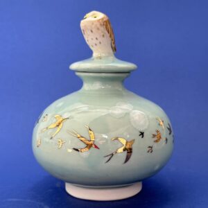 Emily Gravett Instagram - This is one of the more successful items out of my kiln this haul. 
I made three little moon jars and I think I like this one best. 
I’m still deciding whether or not to deglaze the other two as they didn’t come out as I’d expected.  #porcelain #owlsofinstagram #lustreware #nightowl #pottery #ceramics #handmade