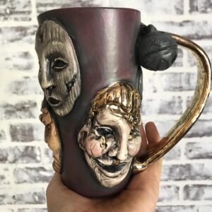 Emily Serpico Instagram - Finished Krampus mug! It has real gold overglaze, and is the only one ❄️ DM if interested #ceramics #overglaze #krampus