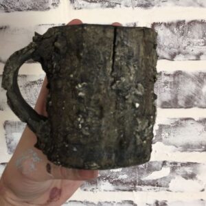 Emily Serpico Instagram - 💀Haunted Forest mugs! First round of dark thorny bark mugs! 💀 They have a mirror black inside! Dm me if interested!  #ceramic #pottery #bark #forest #pnwonderland #glaze #haunted