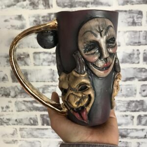 Emily Serpico Instagram - Finished Krampus mug! It has real gold overglaze, and is the only one ❄️ DM if interested #ceramics #overglaze #krampus
